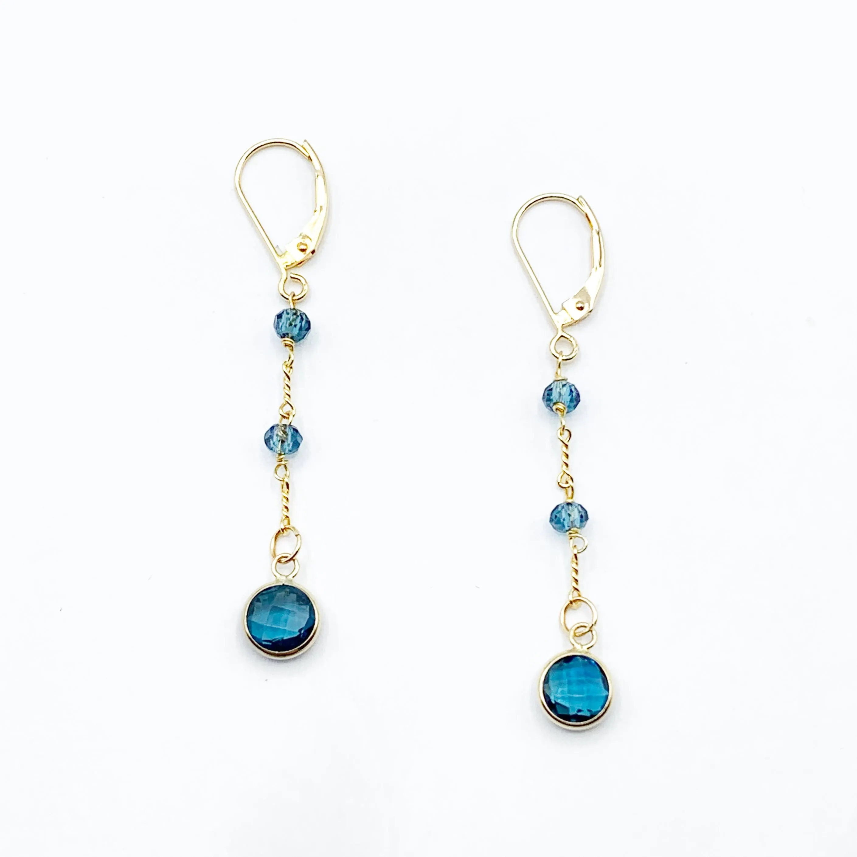 Electric Blue Topaz Floating on a Golden Chain