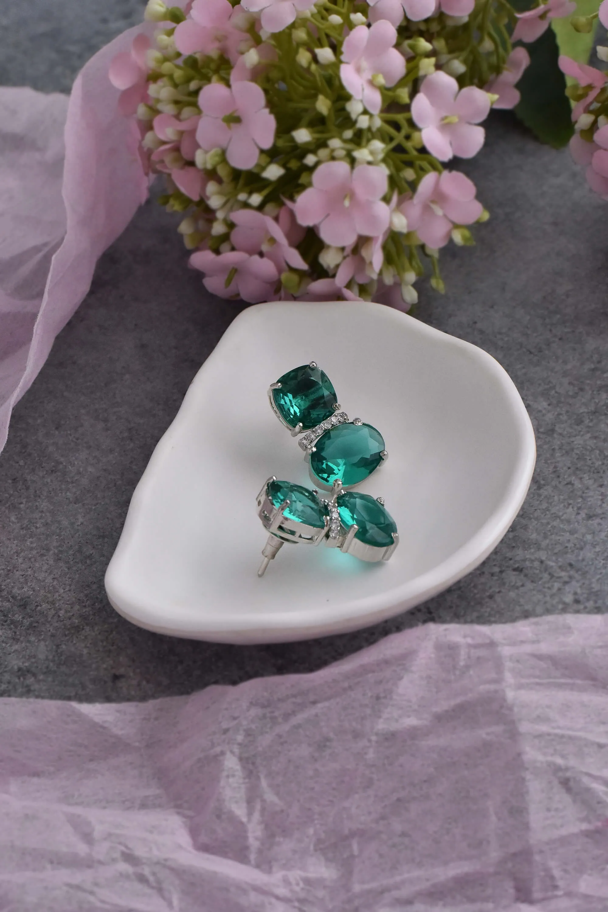 Emerald silver tone zirconia stud earrings