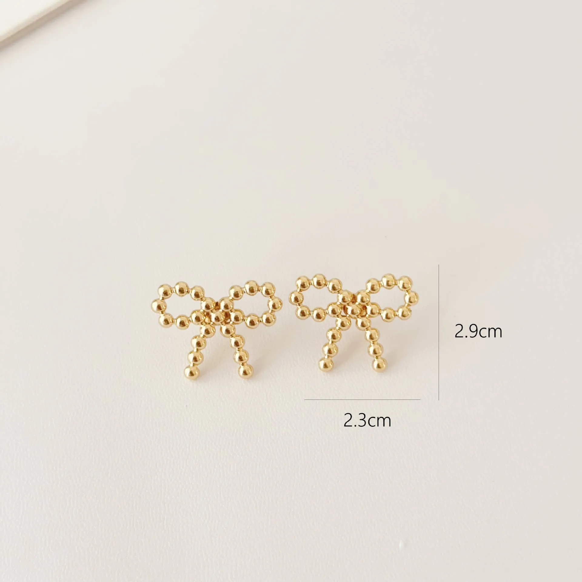 Gold Bow Stud Earring