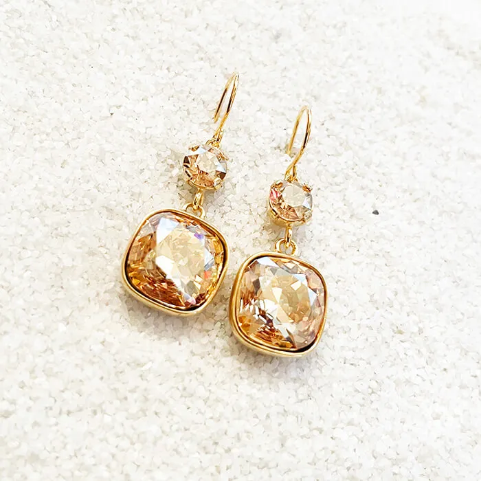 Odin Swarovski gold earrings