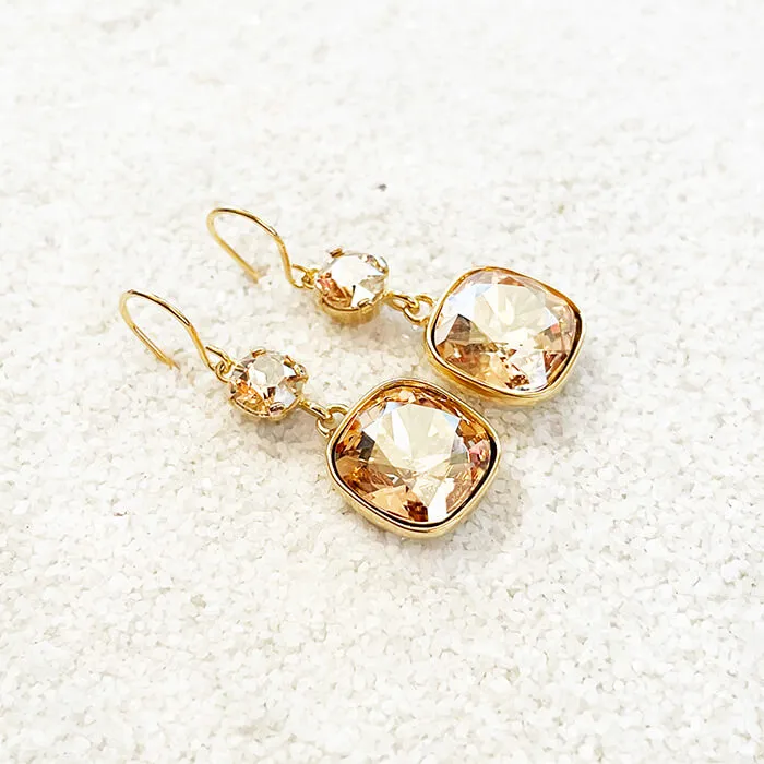 Odin Swarovski gold earrings