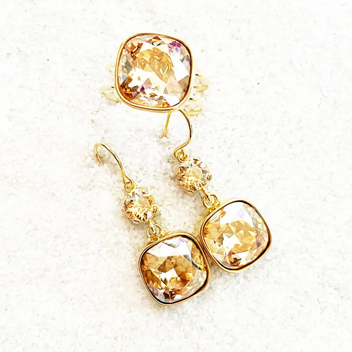 Odin Swarovski gold earrings