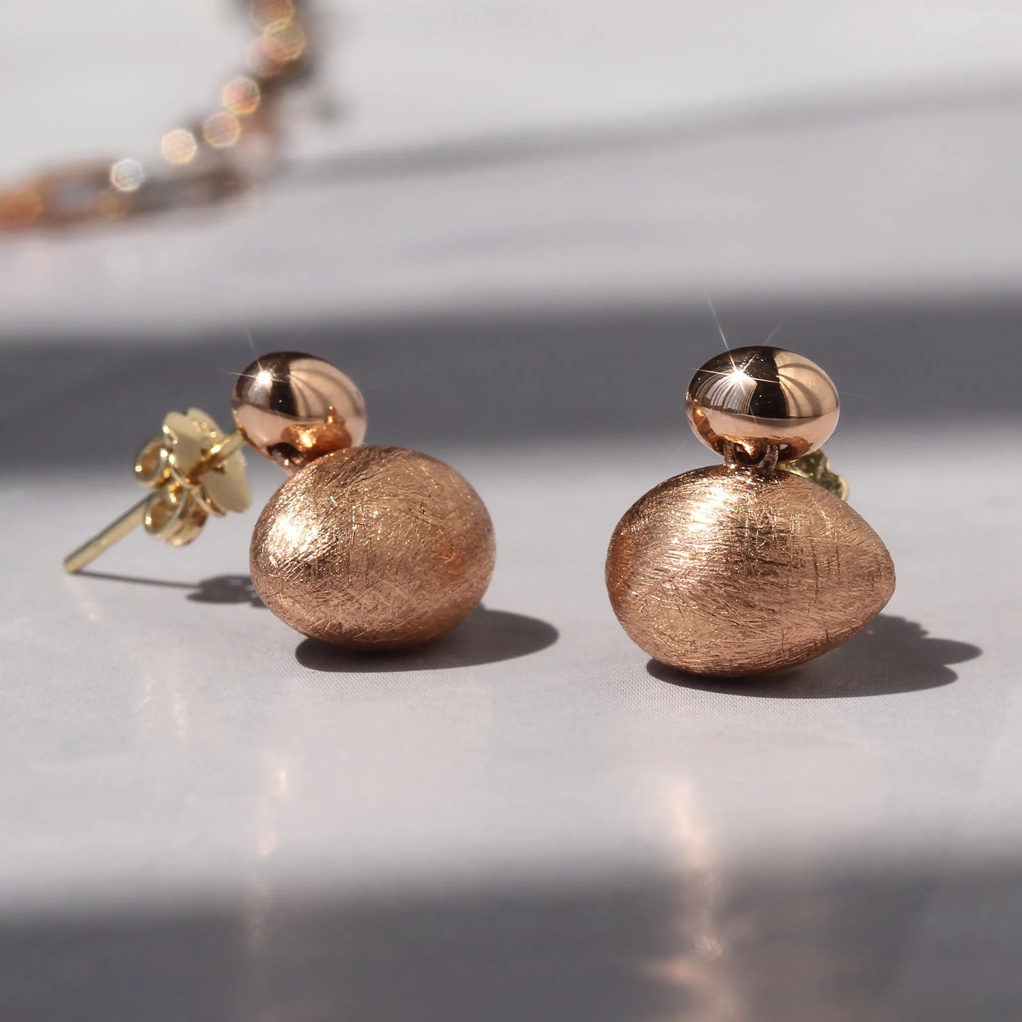 Shimmering Rose Gold Double Rock Earrings