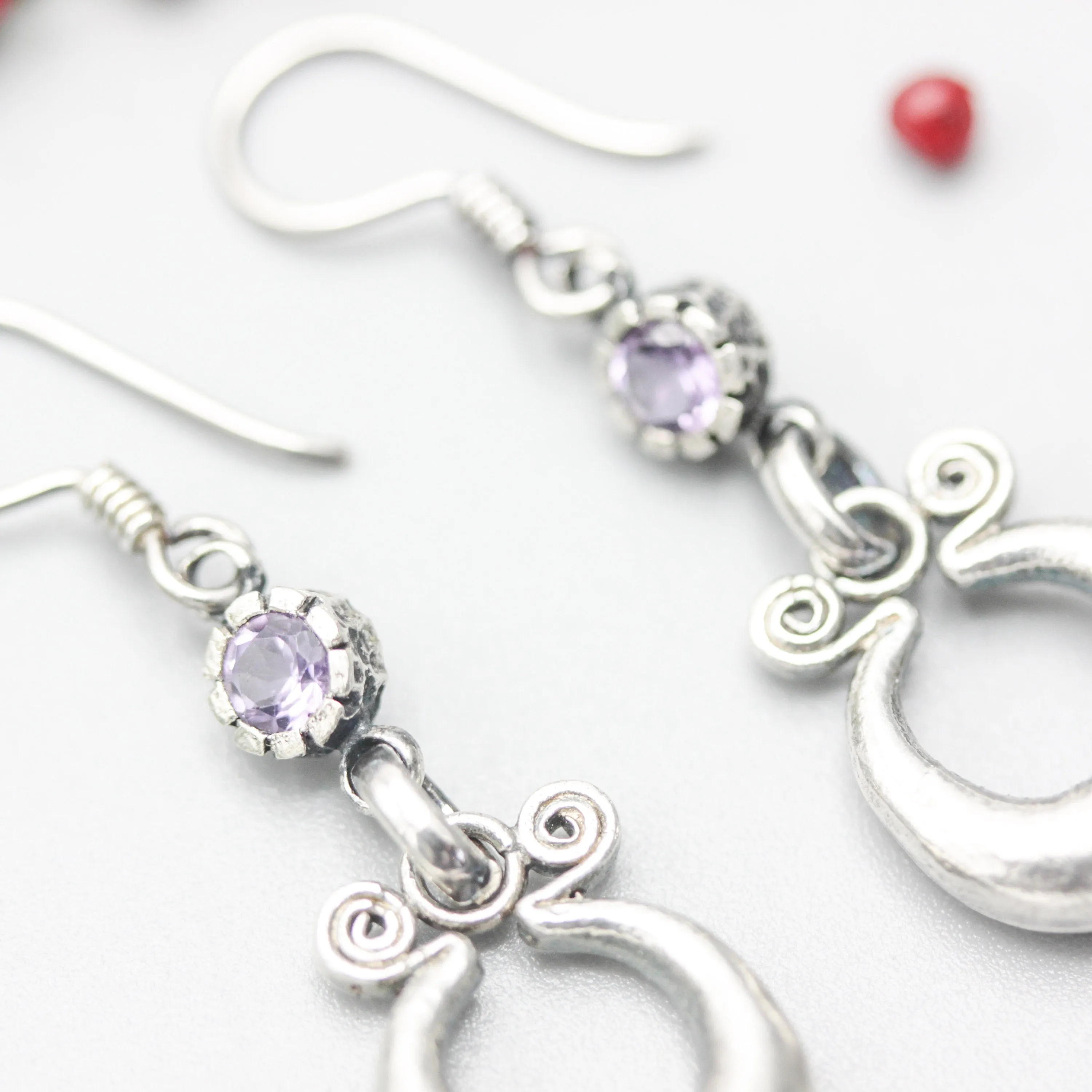 Silver pot luck coin earrings with Amethyst gemstone and hooks style on the top